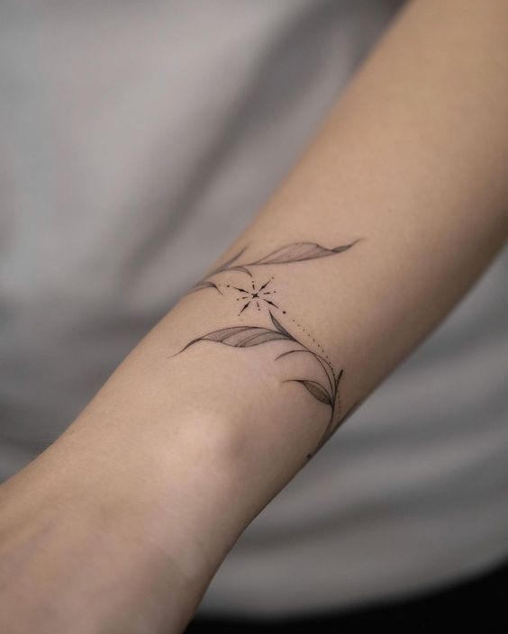 Fine line tattoo geneva , quote tattoo, word , ornamental, tatouage écriture, prix tatouage Geneve, floral